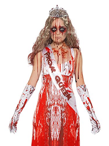 Woman in a bloody white prom queen costume with a tiara and sash.