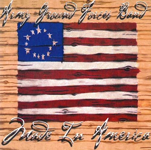 "Distressed American flag on a wooden background with cursive text overlay."