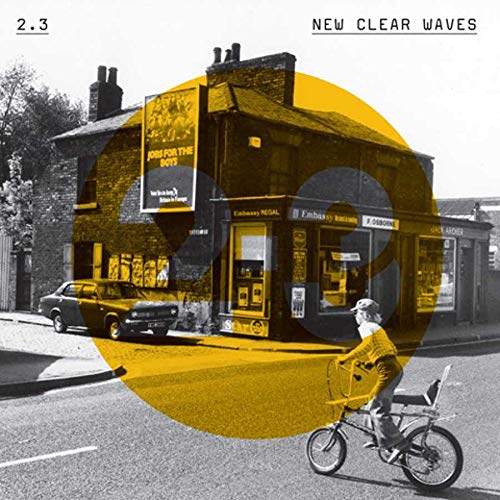 "Album cover featuring a yellow-tinted image of a person riding a bicycle past a shop."