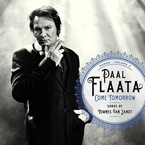"Album cover featuring a man in a suit with ornate text overlay."