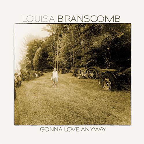 Album cover with sepia-toned photo of a woman walking through a field.