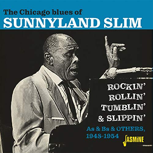 "Album cover featuring black and white photo of man singing into a microphone."