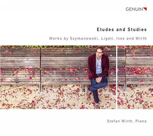 CD cover featuring a man sitting on a bench surrounded by autumn leaves.