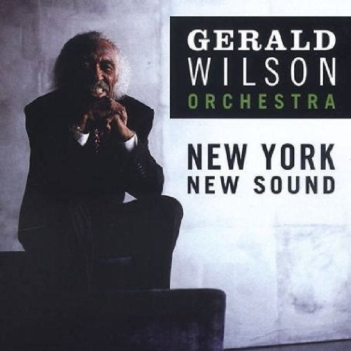 "Album cover with Gerald Wilson sitting on a chair, text reads 'Gerald Wilson Orchestra'."