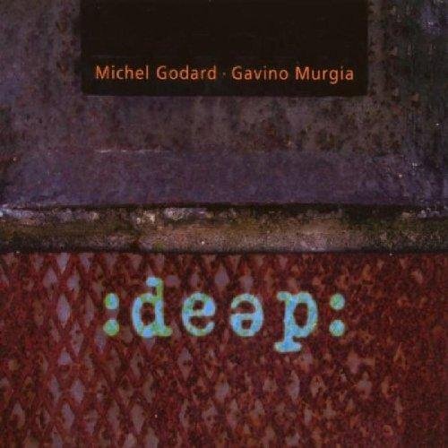 "Album cover with rusty metal grid, green text ':deap:' and orange artist names on black rectangle."
