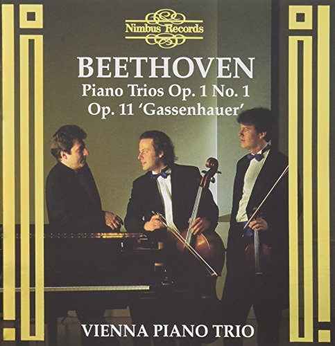 The image shows a CD cover featuring three men in formal attire. Here is a possible alt text: "CD cover with three musicians in tuxedos playing piano, cello, and violin."
