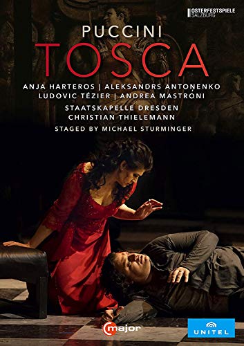 DVD cover for Puccini's Tosca, featuring a woman in red dress kneeling beside a man.
