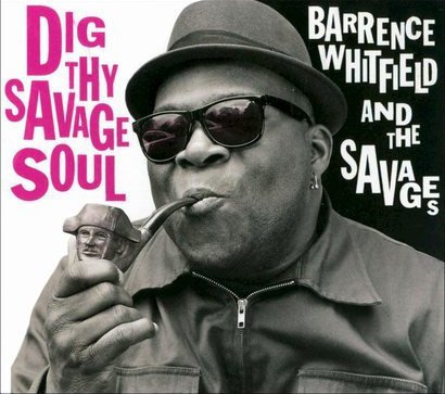 "Album cover featuring a man in hat and sunglasses holding a pipe."