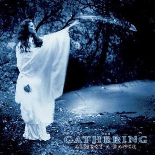 "Album cover featuring a woman in white standing outdoors with a transparent umbrella."