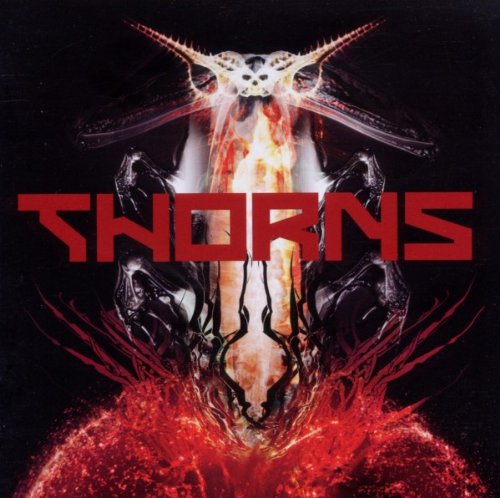 The image shows a red and black album cover with a skull and flames.
