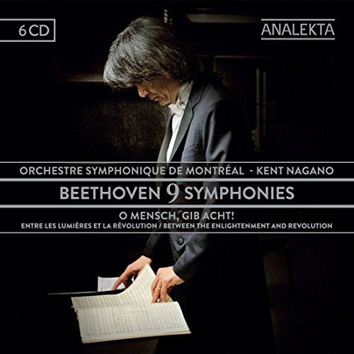 CD cover featuring a man in a suit reading sheet music.