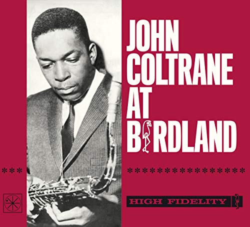 Red album cover with black-and-white photo of John Coltrane holding a saxophone, text "John Coltrane At Birdland".
