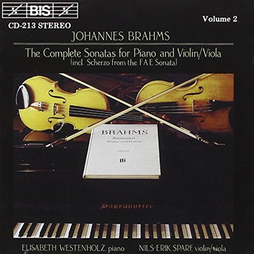 "CD cover with violins, bows, sheet music, and piano keys on a black background."