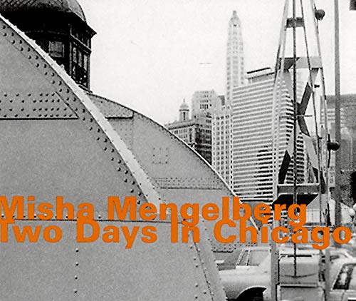 "Album cover with black-and-white cityscape and orange title text."