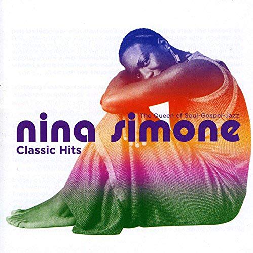 Nina Simone kneels with head on arm, wearing a rainbow dress, on a white background.