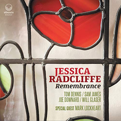 "Album cover featuring stained glass window with red poppy and artist's name."