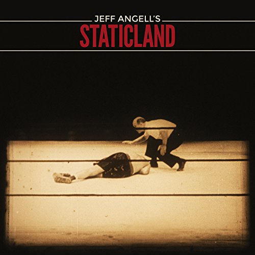"CD album cover with man lying on ground and another bending over him."
