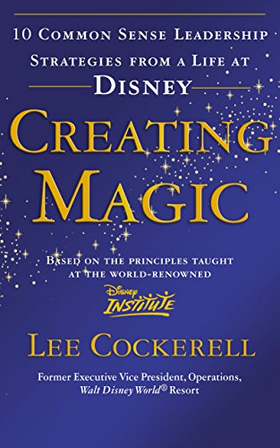 The image depicts a book cover titled "Creating Magic" with a blue background.