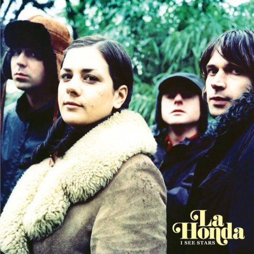 "Album cover featuring four young adults standing outdoors, with 'La Honda' logo."