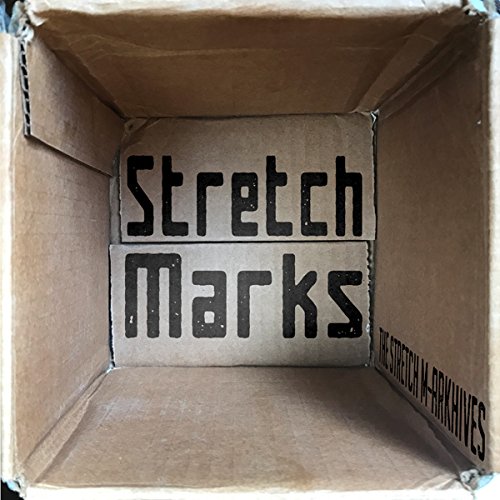 "Cardboard box with 'Stretch Marks' and 'The Stretch M-Arkhives' printed on the inside."