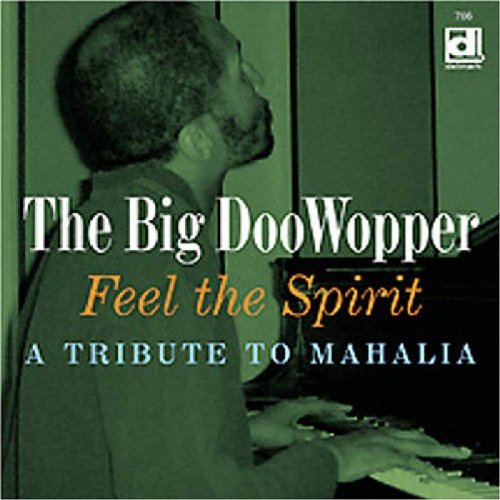 Album cover with a man playing piano, green-toned image, and tribute text overlay.