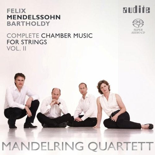 The image shows a CD cover featuring four musicians sitting on the floor. alt text: "CD cover with four musicians in white tops and black pants."