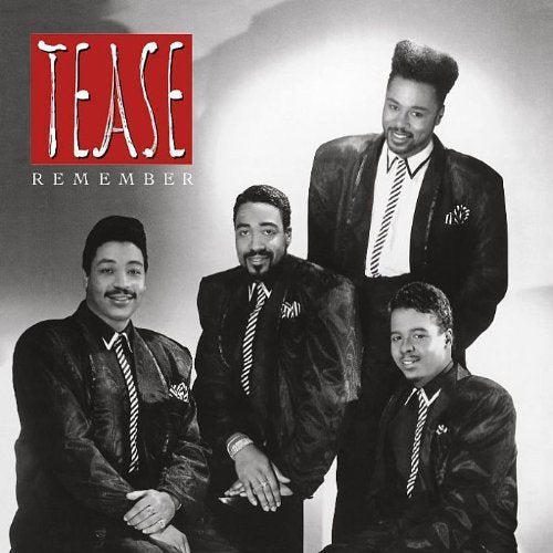 "Black and white image of four men in suits, 'Tease - Remember' album cover."