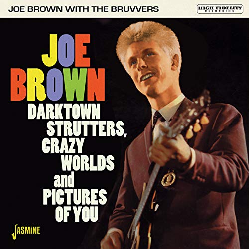 "Album cover featuring Joe Brown holding a guitar, with multicolored text on a black background."