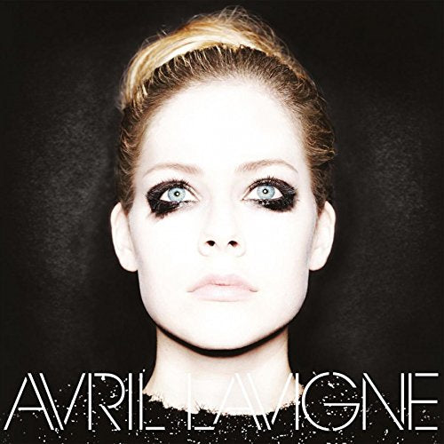 Vinyl record with black cover featuring Avril Lavigne's face and her name in white text.