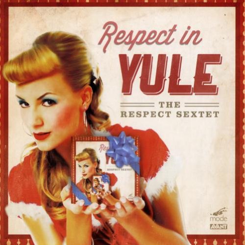 "Album cover featuring a blonde woman in a red dress holding a gift."