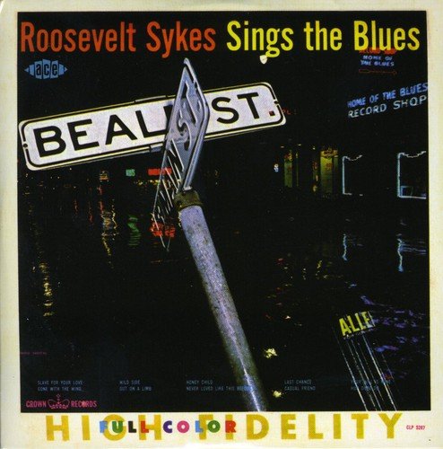 "Album cover with 'Beale St.' sign at night, colorful text, and cityscape reflection."