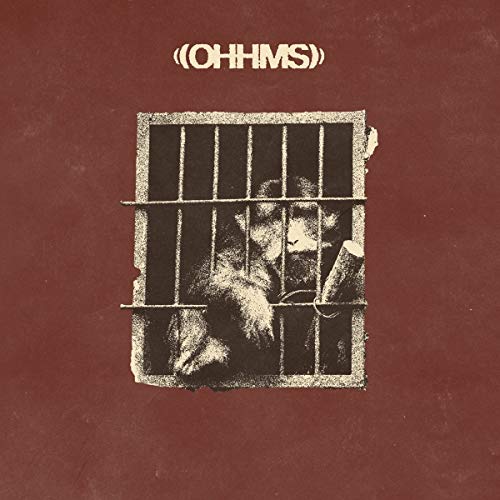 The alt text for the image is: "Red album cover with a monkey behind bars."