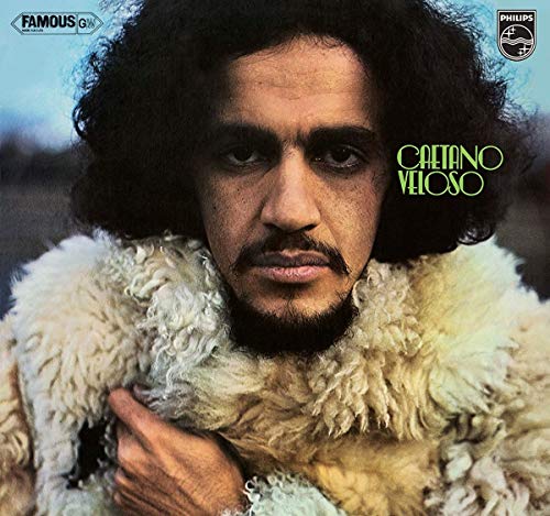 Album cover featuring Caetano Veloso in a sheepskin coat, with dark curly hair and mustache.