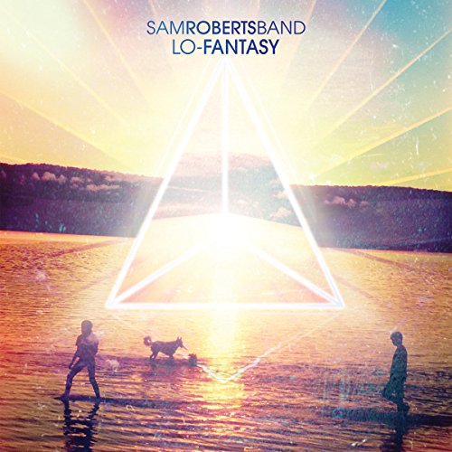Album cover with glowing triangle over a serene lake scene at sunset.