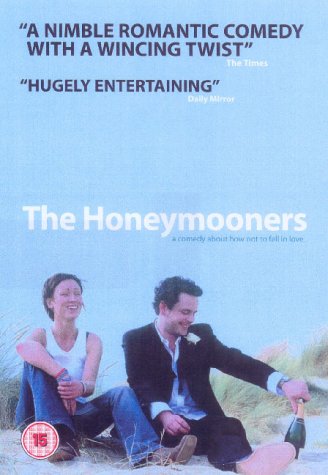 The image shows a DVD cover for "The Honeymooners" with a man and woman.