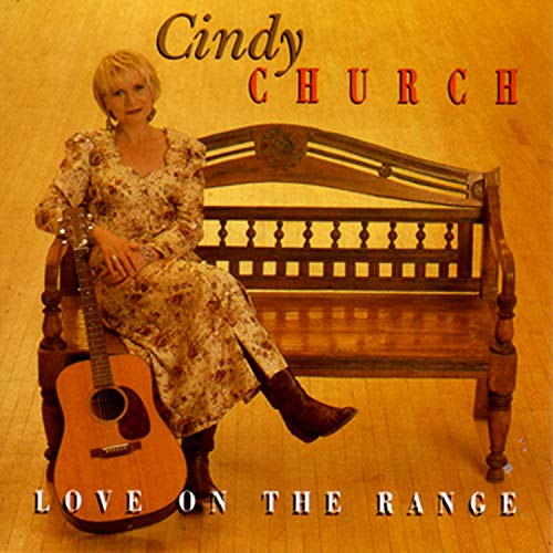 "CD cover featuring Cindy Church sitting on a bench with an acoustic guitar."
