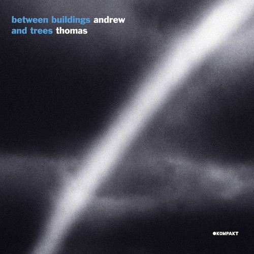 "Album cover with dark background, white diagonal beam, and text 'between buildings and trees andrew thomas'."
