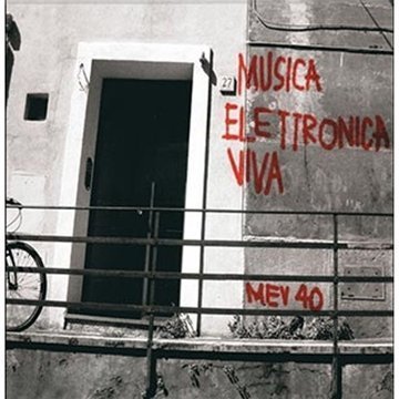 A building with a black door and red graffiti reading "Musica Elettronica Viva" and "MEV 40".