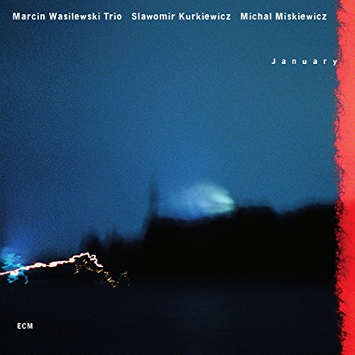 "Album cover with dark blue sky, red edge, and white text."