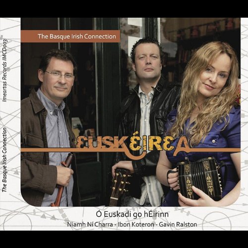 CD cover featuring three musicians with traditional instruments, stylized title "EUSKEIREA" in orange.