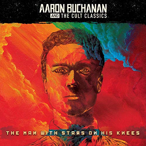 Vinyl album cover featuring a man's face with a colorful, cloudy background.