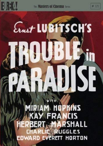 DVD cover for "Trouble in Paradise" with embracing couple illustration and cast list.
