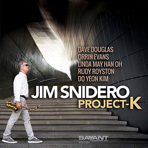 "CD cover art featuring a man with a saxophone on concrete stairs."