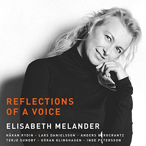 "Album cover with black and white photo of a woman and orange and white text."