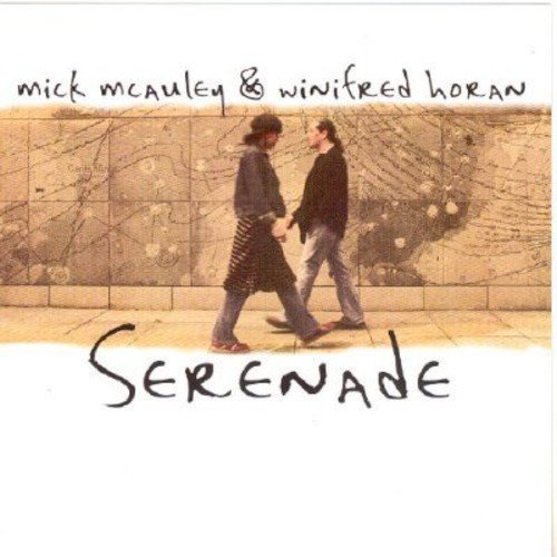 "CD cover with two people walking, 'Serenade' title, and Amazon logo."