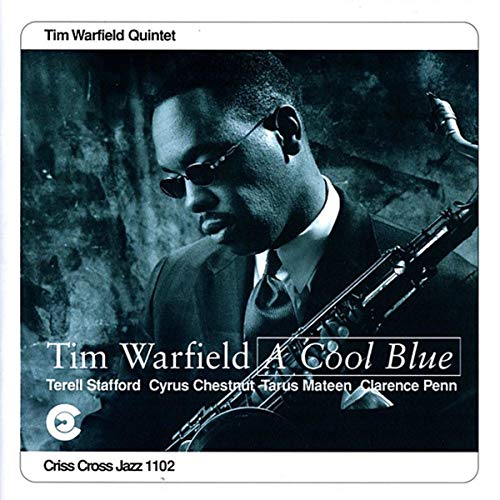 "CD cover with a man holding a saxophone, wearing sunglasses, in a dark background."