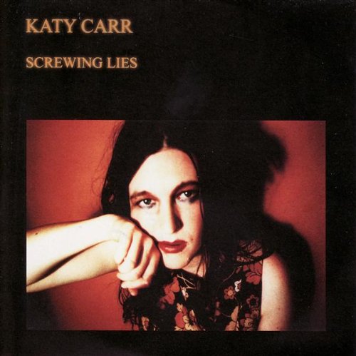 Album cover with a woman resting her head on her hand against a red background.