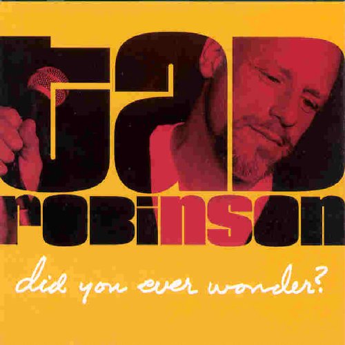 "Tad Robinson album cover with man holding microphone, yellow background, and stylized text."