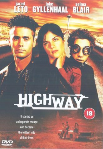 "Highway DVD cover featuring three main characters and a deserted road scene."