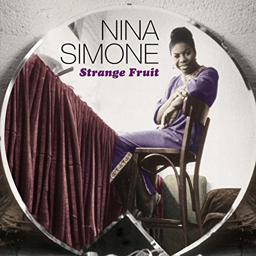 Nina Simone album cover with a woman sitting on a chair, wearing a purple dress.